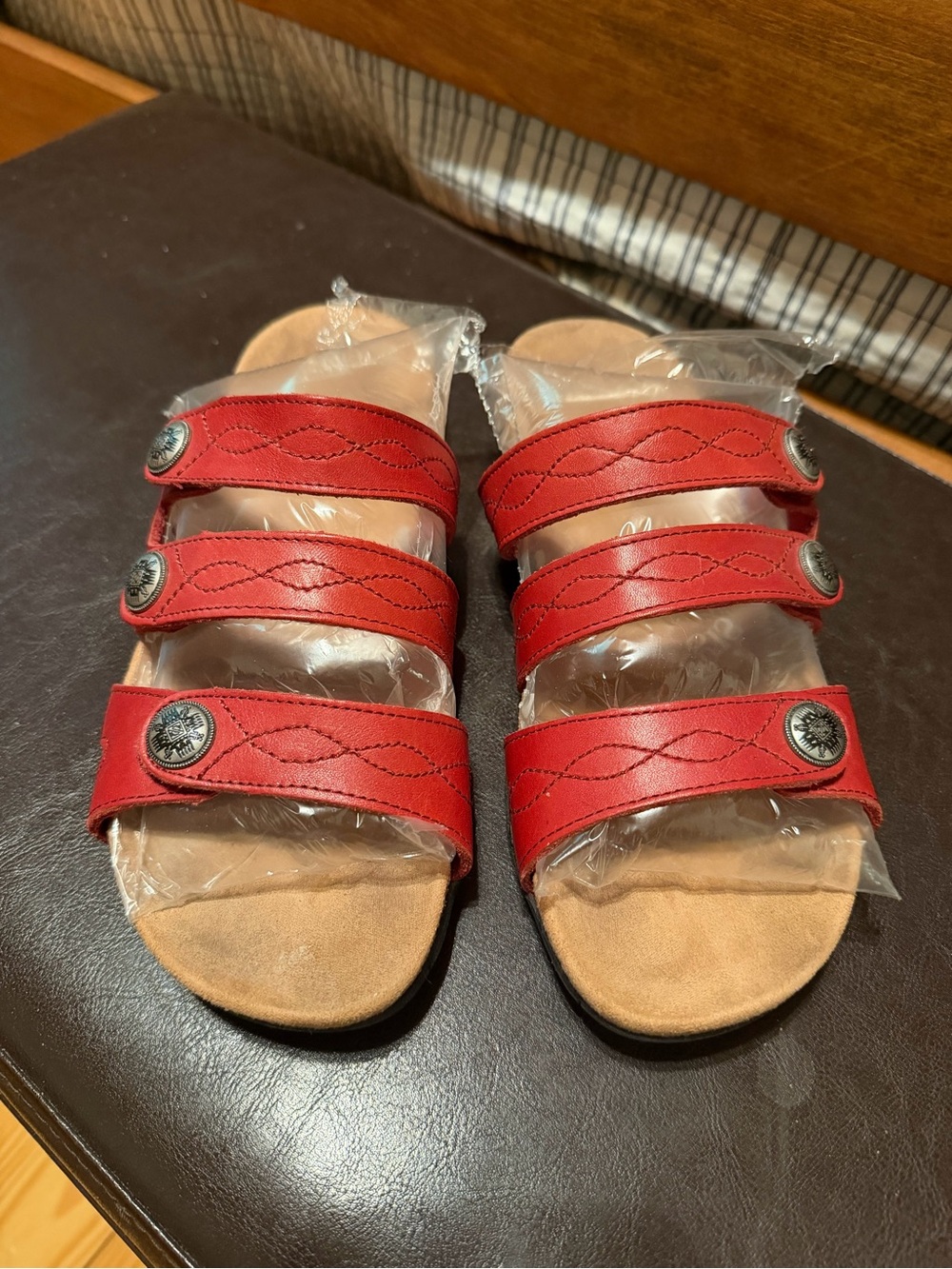 Minnetonka leather adjustable sandals. Red 9.5
